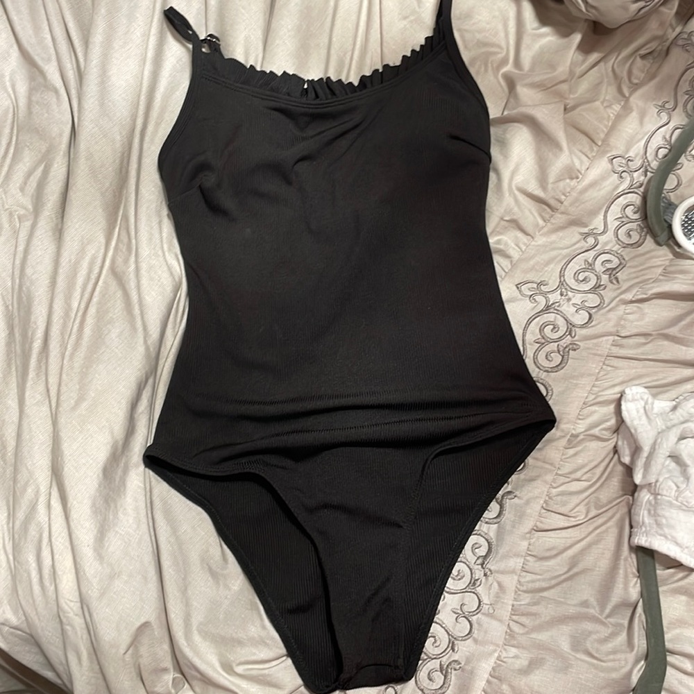 Stretchy one-piece swimsuit.